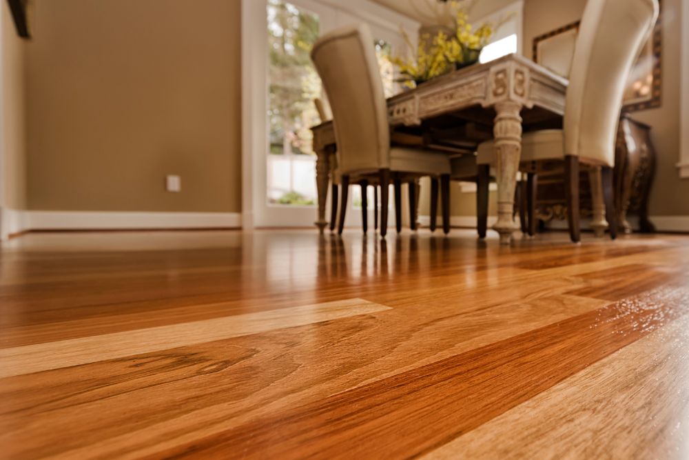 Elegant dining room with hardwood floors and a table, highlighting the beauty of hardwood flooring in San Francisco, CA.